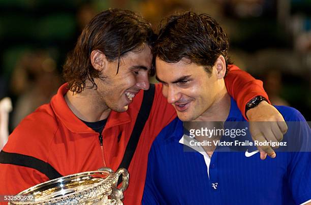 Feb 2009, Melbourne, Australia --- Rafael Nadal of Spain consoles Roger Federer of Switzerland during the trophy presentation after his men's final...