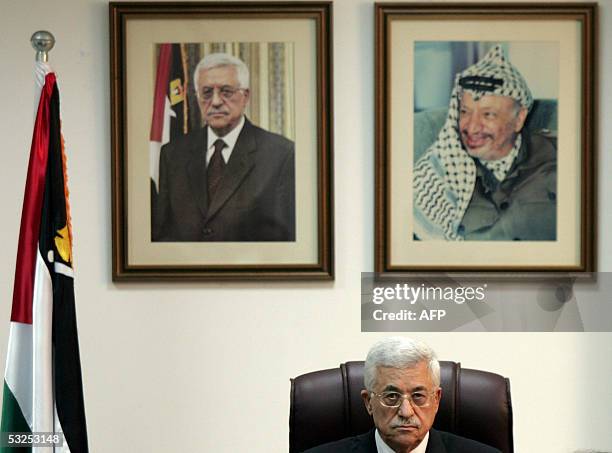 Palestinian leader Mahmoud Abbas attends a meeting with members of the Foreign Press Association at his office in Gaza City 18 July 2005. Abbas said...