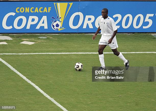 Oscar Garcia of Honduras looks to make a play against Colombia during group play of the FIFA 2005 CONCACAF Gold Cup at the Orange Bowl on July 10,...