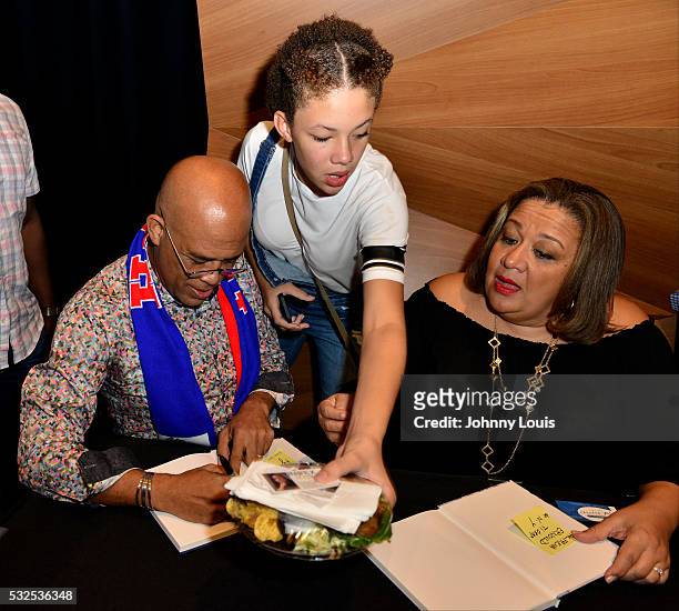 Michel J. Martelly, daughter Malaika Martelly and wife Sophia SaintRémy attend President of Haiti Michel J. Martelly conversation with Elizabeth...