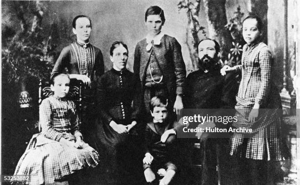 Portrait of Alsatian-born German theologian, musician, physician, and medical missionary Albert Schweitzer at the age of ten with his mother, father,...