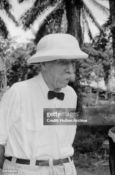 Alsatian-born German theologian, musician, physician, and medical missionary Albert Schweitzer on the grounds of the hospital he founded at...