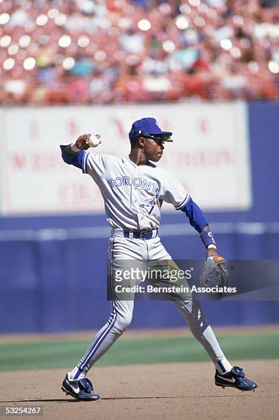 Infielder Tony Fernandez of the Toronto Blue Jays makes a throw during a game on September 5, 1993 at SkyDome Stadium in Toronto, Canada. Fernandez...