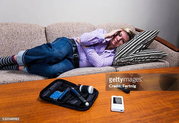 diabetic person experiencing hypoglycaemia or a sugar crash. - symptom stock pictures, royalty-free photos & images