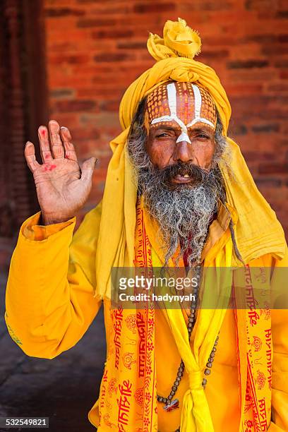 sadhu - indian holyman sitting in the temple - kathmandu stock pictures, royalty-free photos & images
