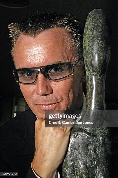 Celebrity Chef Gary Rhodes poses in his restaurant Rhodes Twenty Four in London on the 19th of July 2004.