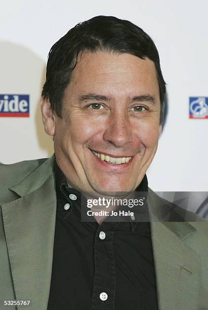 Jools Holland poses at the shortlist launch for the 2005 Nationwide Mercury Prize at The Commonwealth Club on July 19, 2005 in London, England. The...