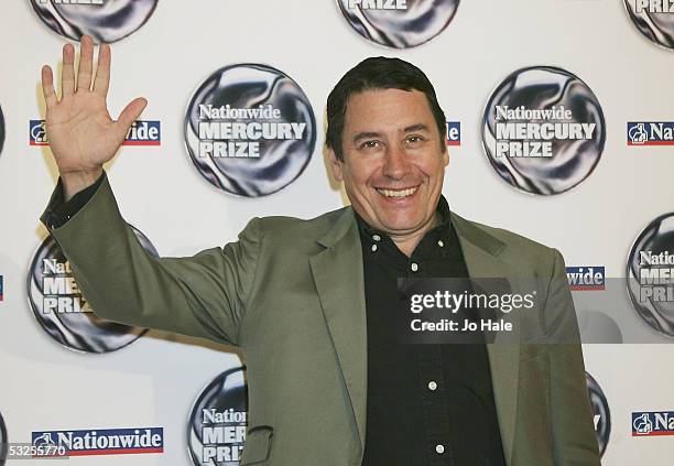 Jools Holland poses at the shortlist launch for the 2005 Nationwide Mercury Prize at The Commonwealth Club on July 19, 2005 in London, England. The...