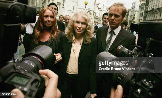 Actress Mia Farrow and Deborah Tate , sister of Polanski's late wife Sharon Tate, leave the Royal Courts of Justice after giving evidence in the...