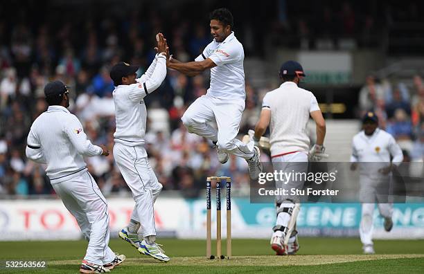 Sri Lanka bowler Dasun Shanaka celebrates after dismissing England batsman Alastair Cook during day one of the 1st Investec Test match between...