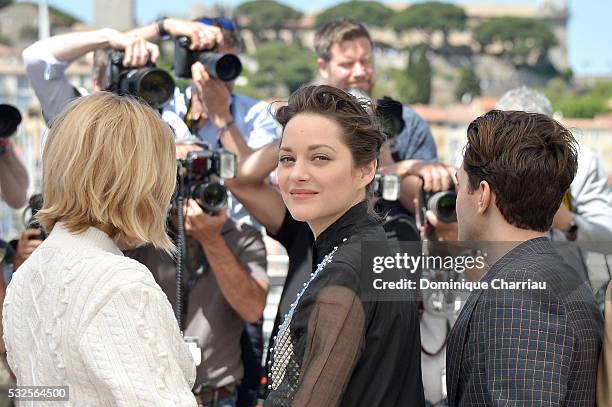 Lea Seydoux, Marion Cotillard and Xavier Dolan attend the "It's Only The End Of The World " Photocall during the 69th annual Cannes Film Festival at...