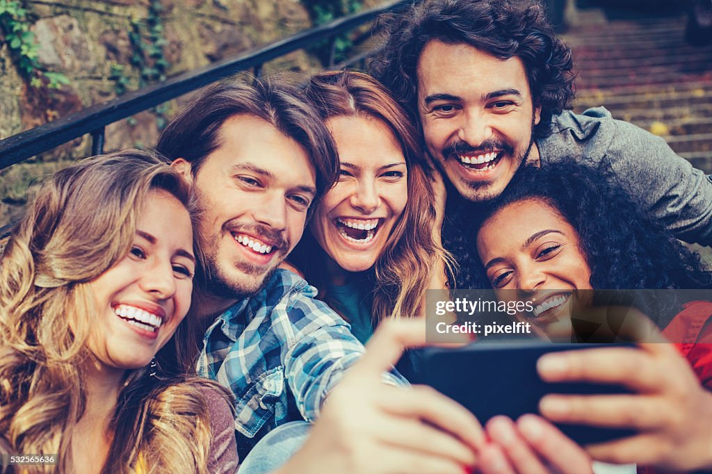 Group of friends making selfie
