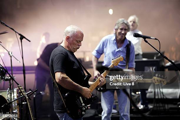 Musicians David Gilmour and Roger Waters of Pink Floyd perform on stage at "Live 8 London" in Hyde Park on July 2, 2005 in London, England. The free...