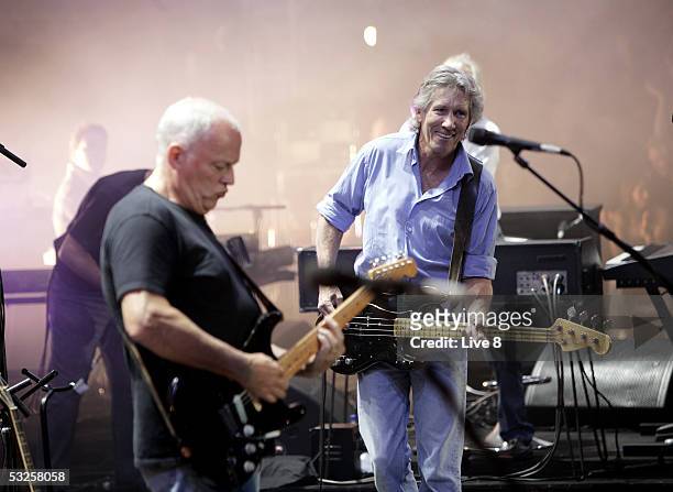 Musicians David Gilmour and Roger Waters of Pink Floyd perform on stage at "Live 8 London" in Hyde Park on July 2, 2005 in London, England. The free...