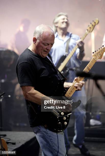 Musicians David Gilmour and Roger Waters of Pink Floyd perform on stage at "Live 8 London" in Hyde Park on July 2, 2005 in London, England. The free...