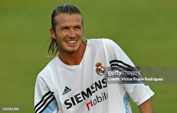 Real Madrid's David Beckham of England smiles during a team's training session in Madrid on August 14, 2003. Photo by Victor Fraile --- Image by ©...