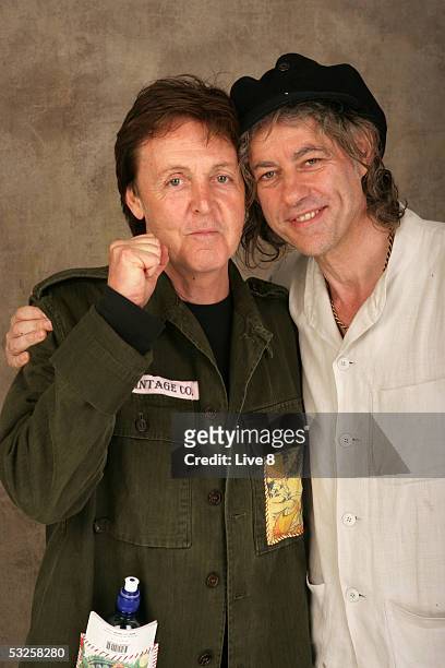 Paul McCartney and Bob Geldof pose for a studio portrait backstage at "Live 8 London" in Hyde Park on July 2, 2005 in London, England. The free...
