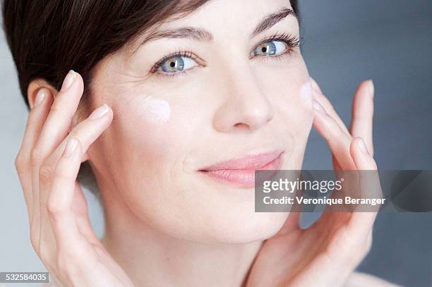 face care - wrinkled face stock pictures, royalty-free photos & images