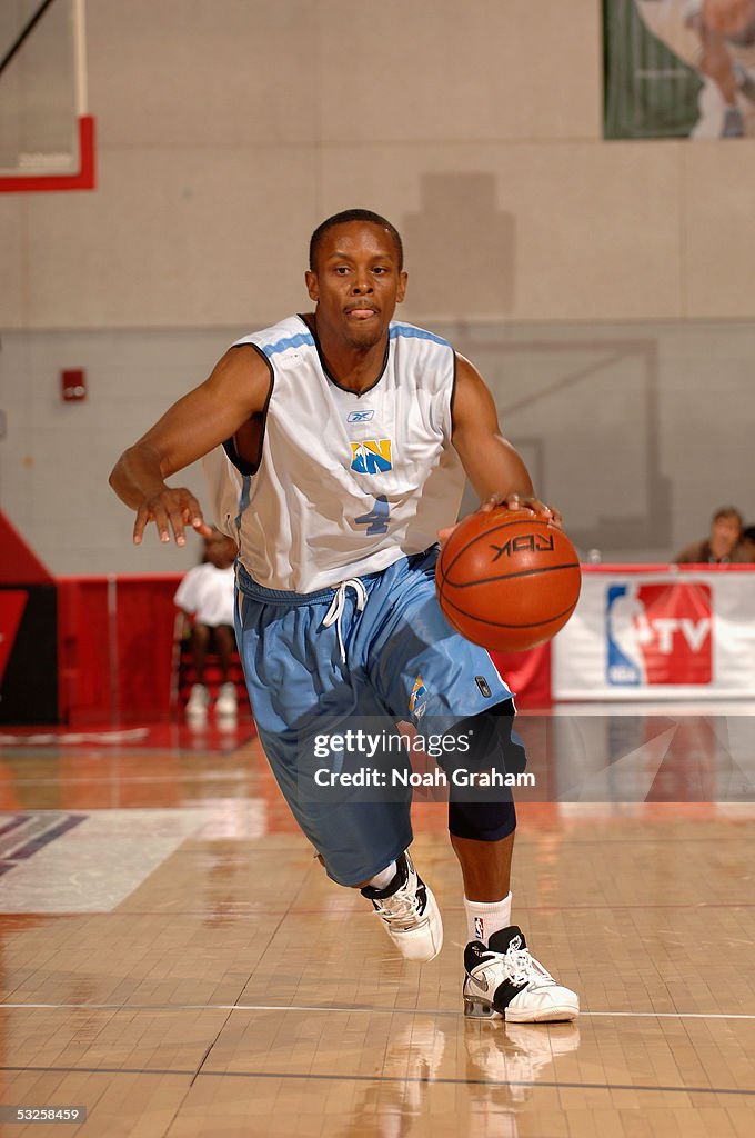Tyus Edmond Tyus Edney of the Denver Nuggets moves the ball during the NBA Vegas ...