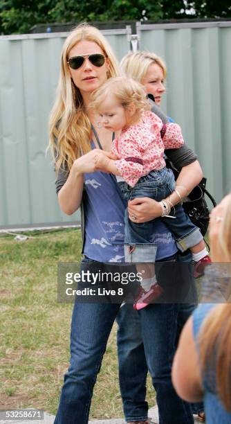 Actress and wife of Coldplay's Chris Martin, Gwyneth Paltrow, with their daughter Apple are seen backstage at "Live 8 London" in Hyde Park on July 2,...