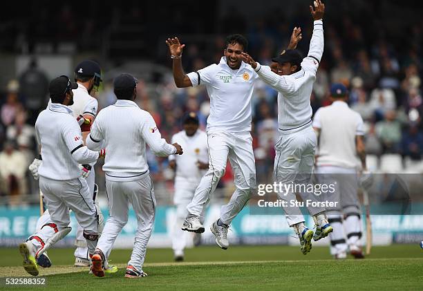Sri Lanka bowler Dasun Shanaka celebrates after dismissing England batsman Nick Compton during day one of the 1st Investec Test match between England...