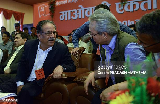 Maoist chairman, Pushpa Kamal Dahal, known as Prachanda Maoist chairman and political leader Ram Bahadur Thapa "Badal" interact during the...