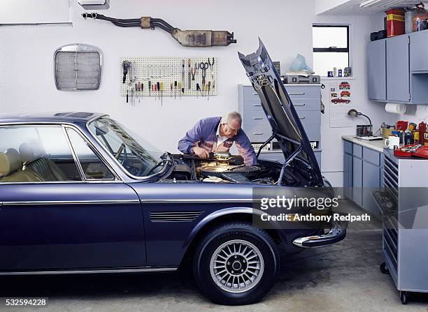 senior man working on his car - car engine fotografías e imágenes de stock