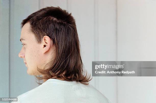 young man with mullet - hairstyle stock pictures, royalty-free photos & images