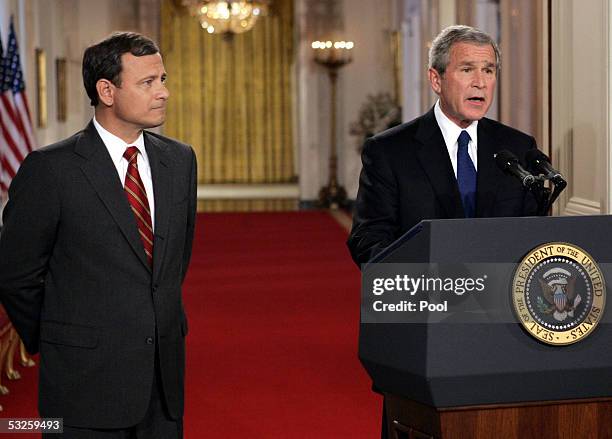 Judge John G. Roberts, Jr. Of the U.S. Court of Appeals for the District of Columbia Circuit looks on as President George W. Bush nominates him to...