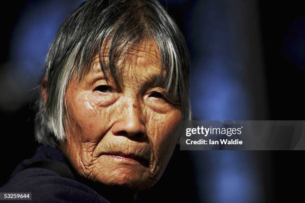 Falun Gong practitioner attends an event to commemorate the sixth anniversary of the beginning of the persecution of Falun Gong July 20, 2005 in...