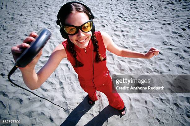 enjoying her discman - personal stereo stock pictures, royalty-free photos & images