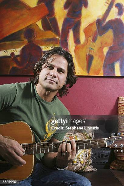 Singer Jon Stevens poses with a guitar July 15, 2005 in Sydney, Australia