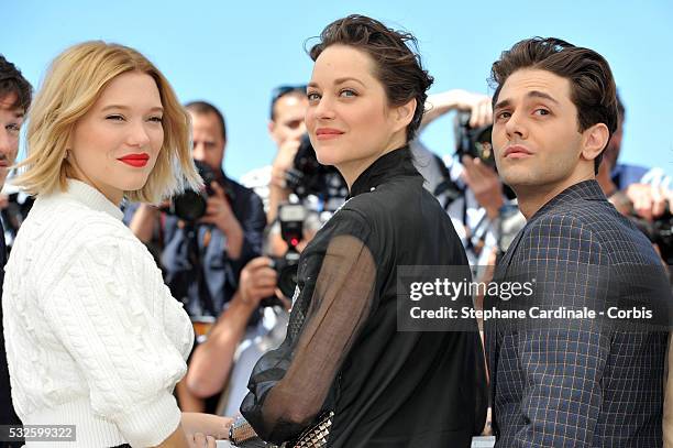 Lea Seydoux, Marion Cotillard and Xavier Dolan attend the "It's Only The End Of The World " Photocall during the 69th annual Cannes Film Festival at...