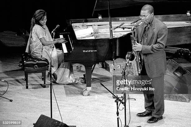 Ravi Coltrane and Alice Coltrane performing at Town Hall as part of the Texaco New York Jazz Festival on June 14, 1998.This image:Alice Coltrane,...