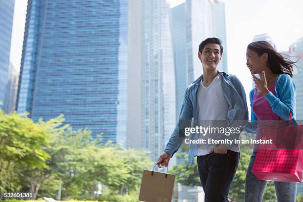 couple shopping in the city - malay lover stock pictures, royalty-free photos & images