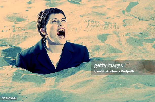 screaming businesswoman buried in sand - drunkna bildbanksfoton och bilder