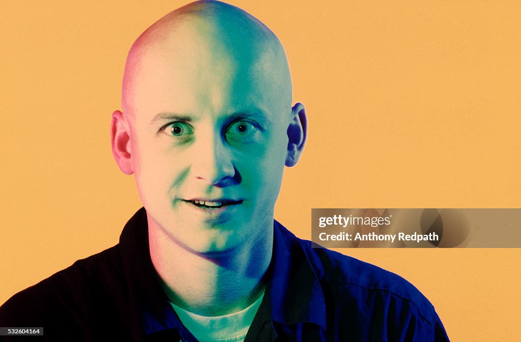Bald guy staring