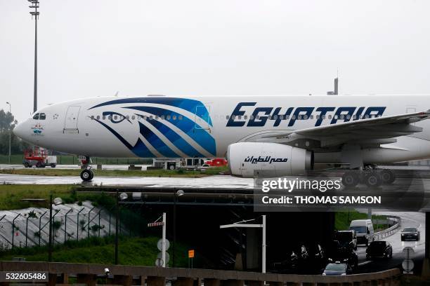 This picture taken on May 19 shows an Egyptair Airbus A330 from Cairo taxiing at the Roissy-Charles De Gaulle airport near Paris after its landing a...