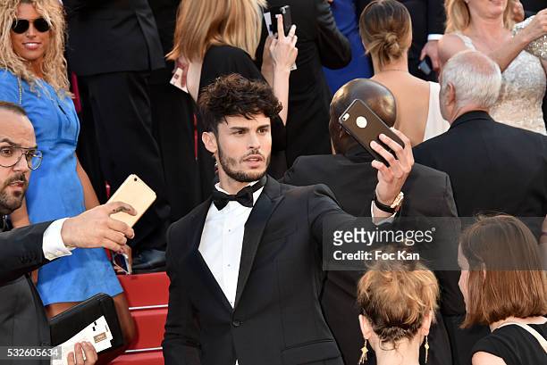 Jean Baptiste Giabicconi poses for a selfie during the 'Julieta' premiere during the 69th annual Cannes Film Festival at the Palais des Festivals on...