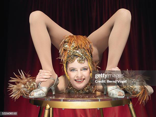 performing female contortionist - circus performer stock pictures, royalty-free photos & images