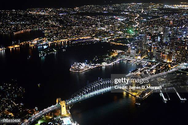 Photographed from 2500 feet above Sydney, the CBD and Bondi twinkle in the evening lights on September 19, 2015 in Sydney, Australia.