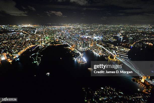 Photographed from 2500 feet above Sydney, the CBD and Bondi twinkle in the evening lights on September 19, 2015 in Sydney, Australia.