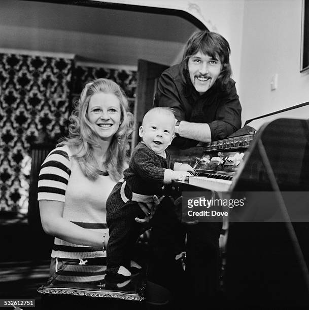 Len 'Chip' Hawkes of The Tremeloes with his wife actress Carol Dilworth and son Chesney, 10th February 1972.