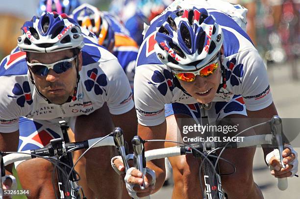 Frenchman Carlos Da Cruz and his teammate Swedish Thomas Lovkvist ride alongside during the 17th stage of the 92nd Tour de France cycling race...