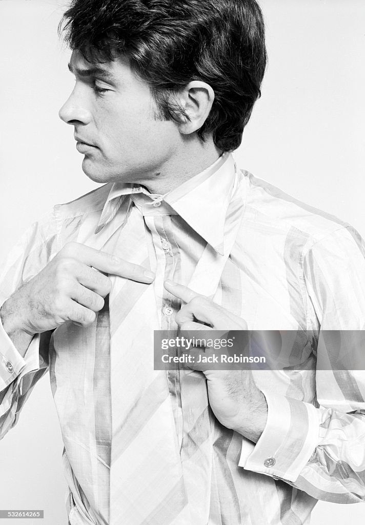 Warren Beatty Ripped Portrait series of actor Warren Beatty as he knots his necktie, late ...