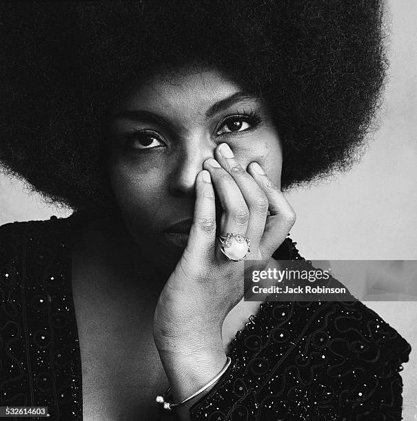 Studio headshot portrait of American pop singer Roberta Flack with her chin resting on her hand, November 5, 1969.