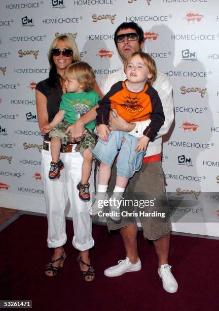 Singer Nicole Appleton, boyfriend, musician Liam Gallagher of Oasis, their son Gene and possibly Appleton's nephew Ace Howlett attend the HomeChoice...