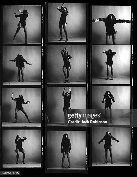 Contact sheet of full-length studio portraits of American rock singer Tina Turner, dressed in a dark crocheted mini-dress, in various poses, New...
