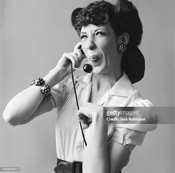 Studio portrait of American comedian and actor Lily Tomlin in costume as a switchboard operator from the television series, 'Laugh-In', March 29,...