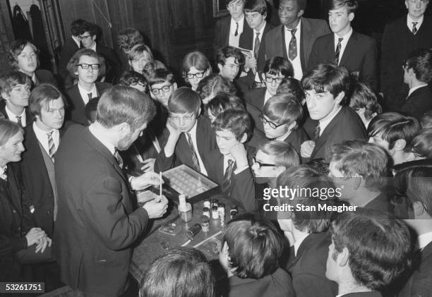 Detective Inspector Derek Wyatt gives a talk and demonstration to Brentwood schoolboys on the dangers of taking drugs, 23rd January 1970.